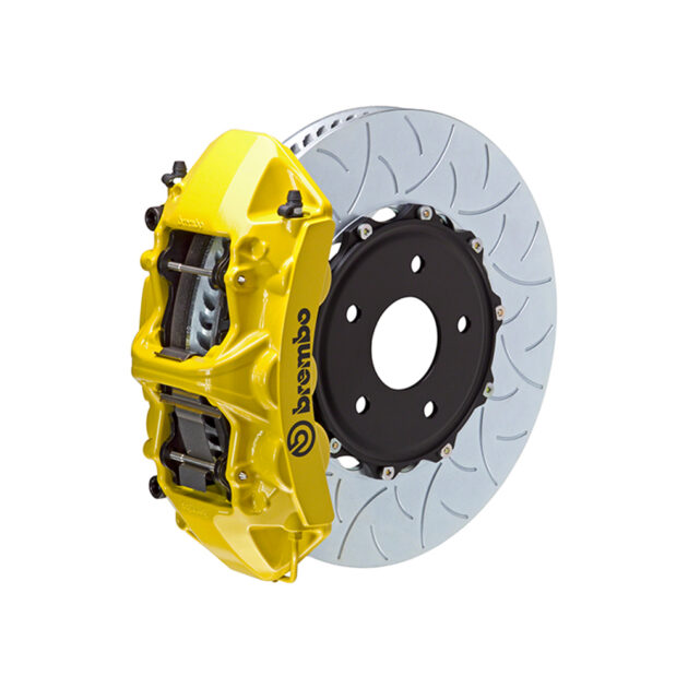 A yellow brake disc with two calipers on it.