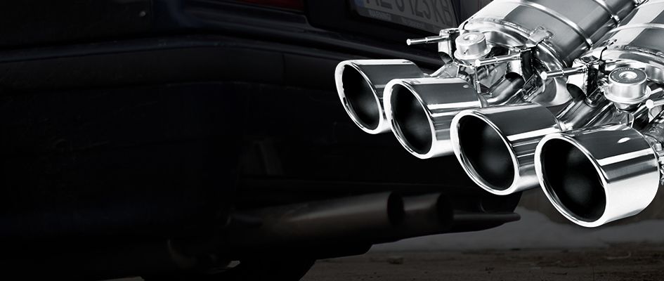 A close up of the exhaust pipes on a car